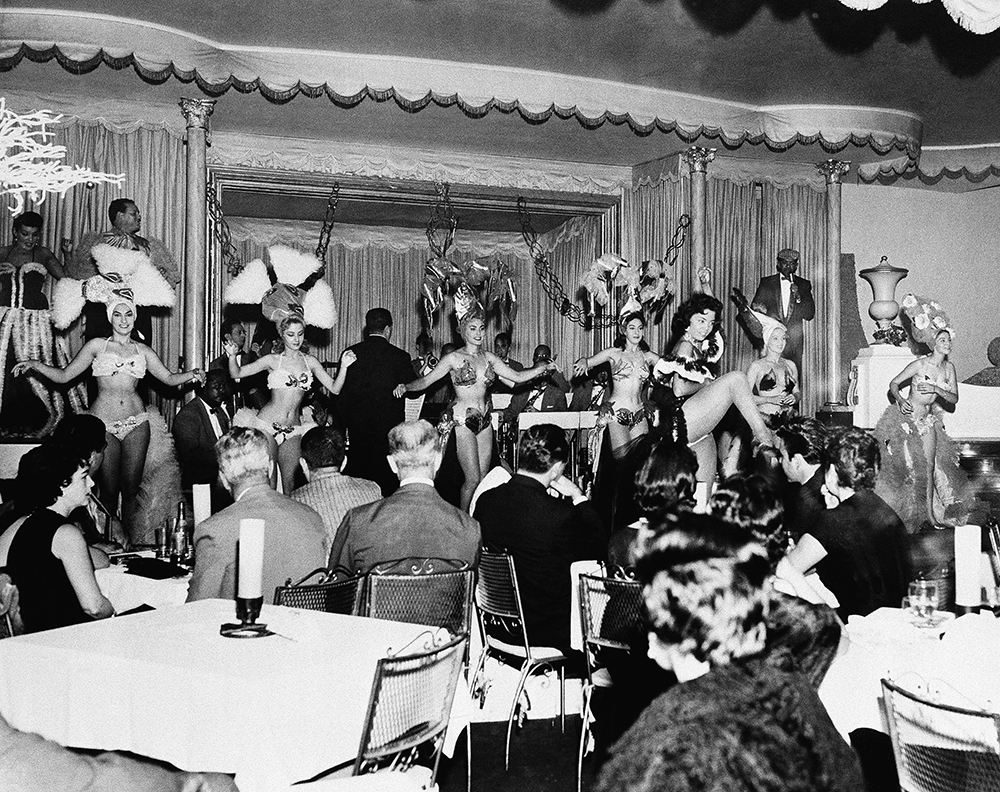 Dancers entertain patrons at Sans Souci Night Club, January 12, 1958 one of several centers of legal gambling in Havana, Cuba. Cuba's lucrative gambling industry reportedly is being divided among U.S. gamblers who are dealing themselves huge profits. (AP Photo)
