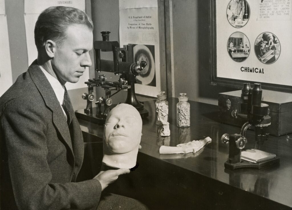 D. J. Parsons of the Federal Bureau of Identification shows off a cast of John Dillinger’s death mask