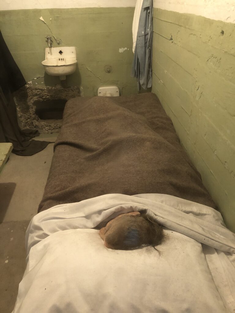 Clarence Anglin created a replica dummy head meant to fool prison guards after he escaped through the vent. The head is on display in cell 152. Courtesy of Christian Cipollini