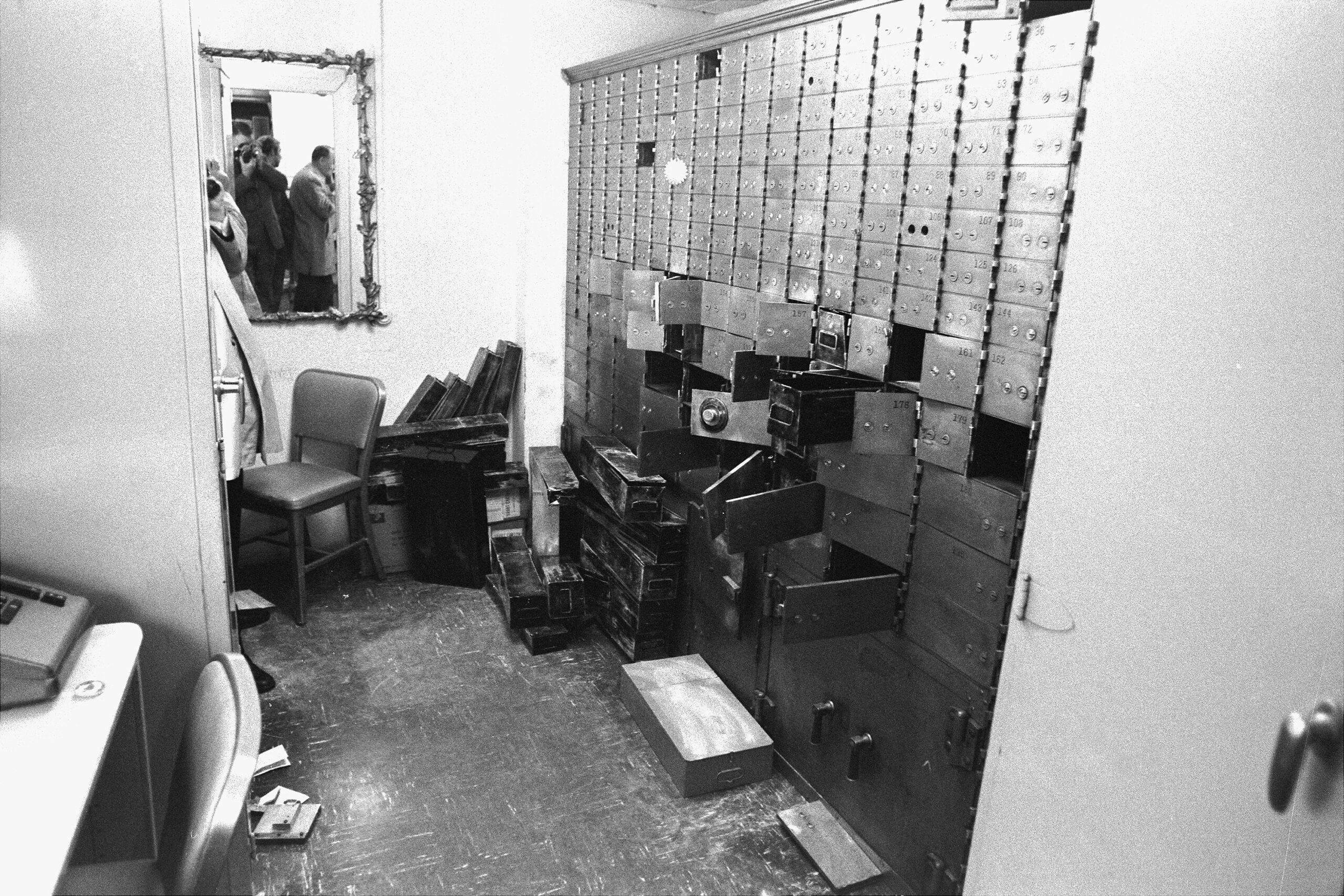 This crime scene photo from the Pierre Hotel robbery shows the safe room after the heist. Law enforcement initially thought the boxes were chosen at random, but insiders later shared the culprits had a list of contents that informed their selections. New York Daily News Archive