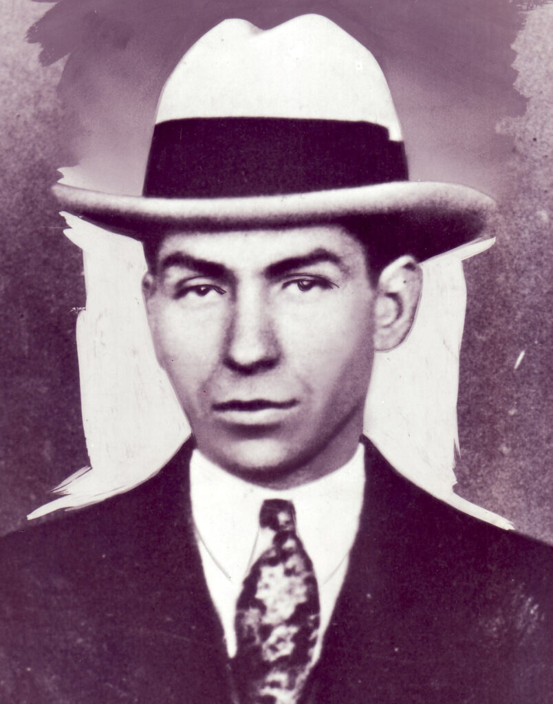 This mugshot from a 1926 arrest reveals Luciano’s appearance before his face-altering “ride.” Cipollini Collection