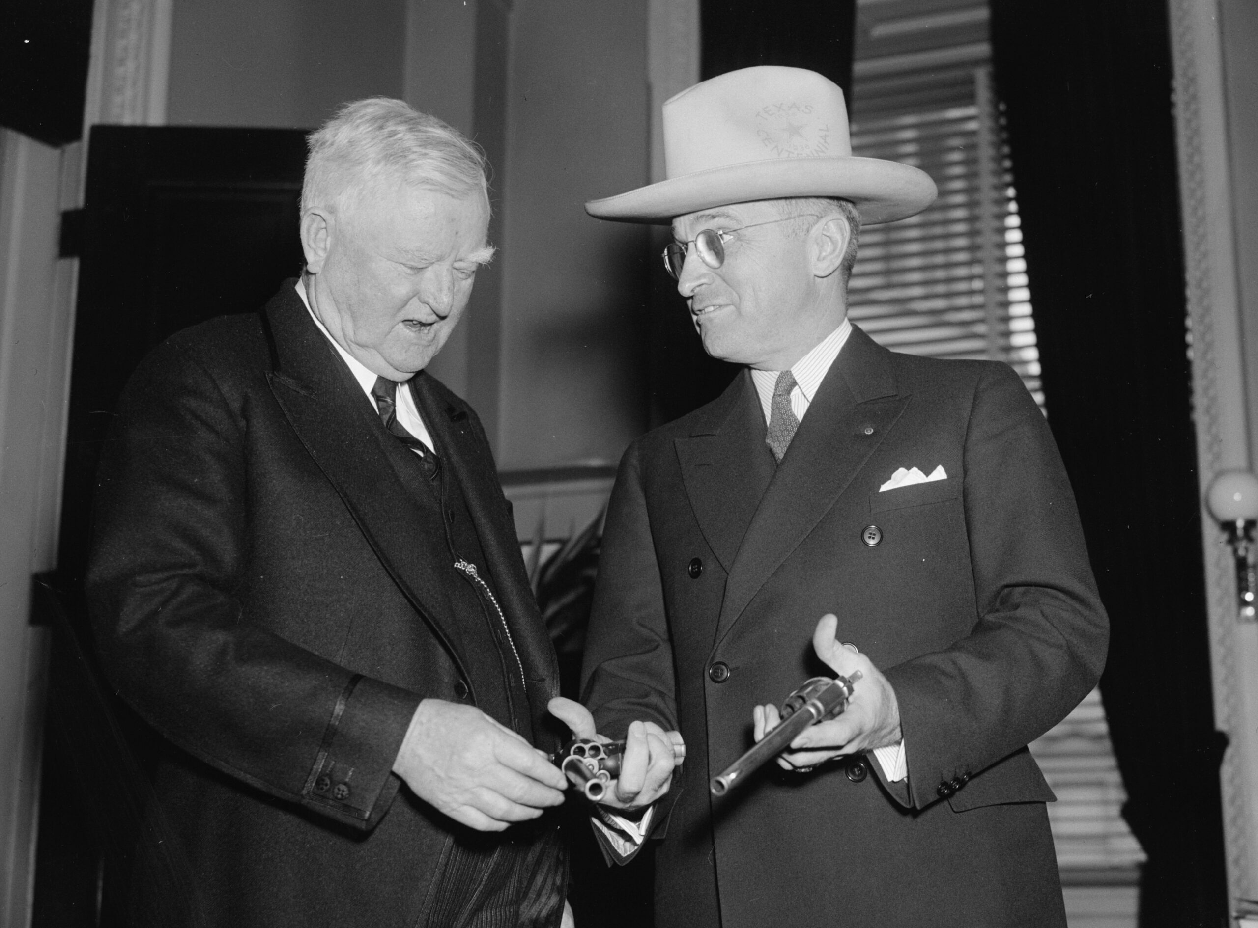 Eric Dezenhall rates Harry Truman as a leader who “would not have been president without the Mob” for his involvement with the Kansas City political machine, which was heavily influenced by organized crime. In this photo taken in the late 1930s, Senator Truman, right, examines revolvers with then Vice-President John Nance Garner. Library of Congress