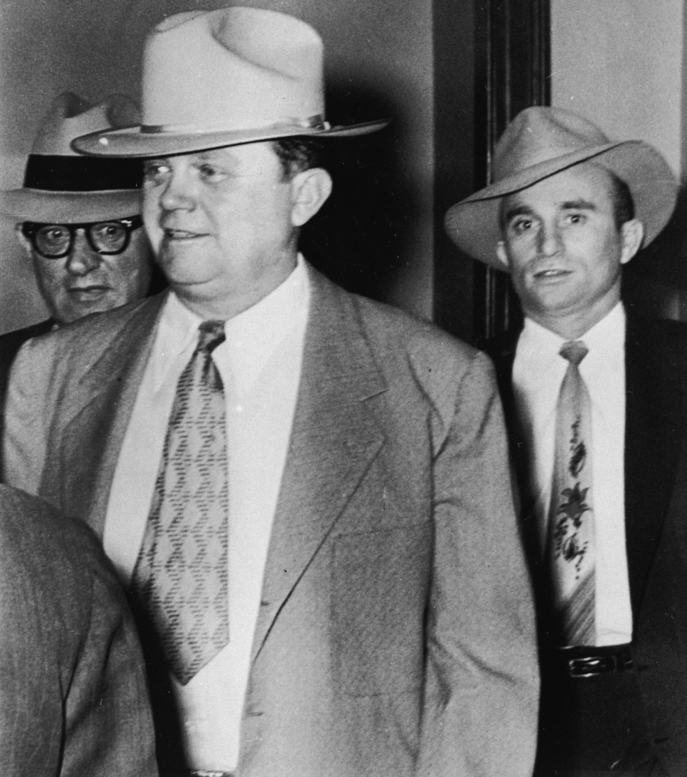 Casino owner Benny Binion leaves federal court in Las Vegas in November 1952 after petitioning a judge not to extradite him to Texas to face tax evasion charges. A month later, he was convicted and sentenced to five years in prison. Associated Press