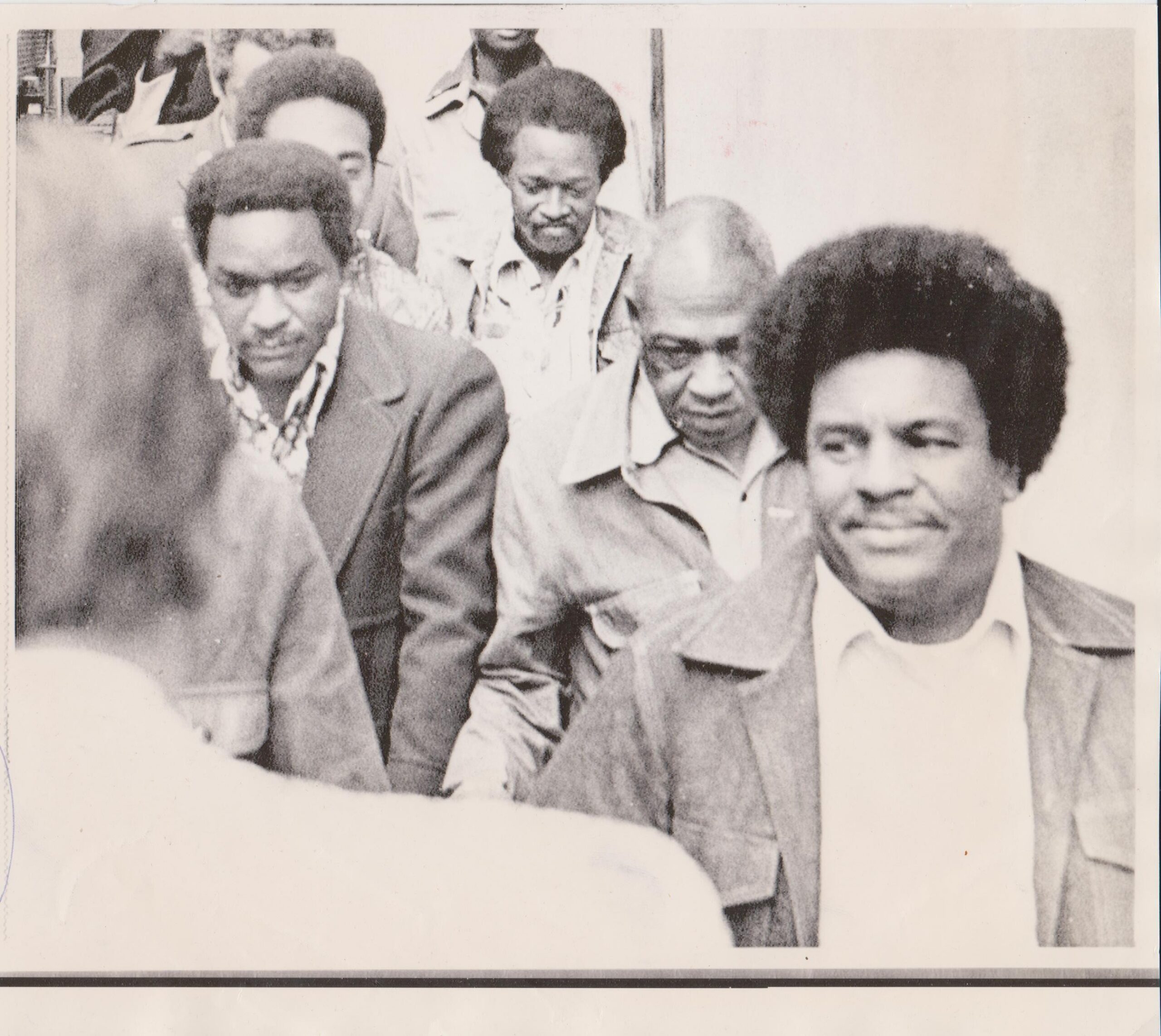Leslie “Ike” Atkinson, right, is escorted from court following his sentencing on June 5, 1976. Courtesy of Cipollini Collection