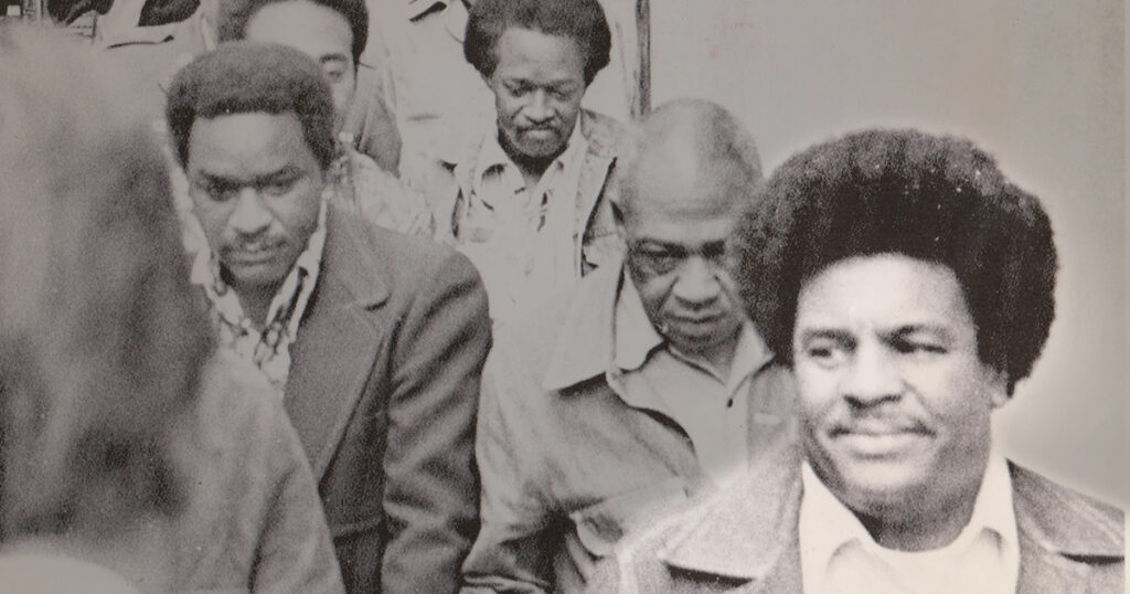 Leslie “Ike” Atkinson, right, is escorted from court following his sentencing on June 5, 1976. Courtesy of Cipollini Collection