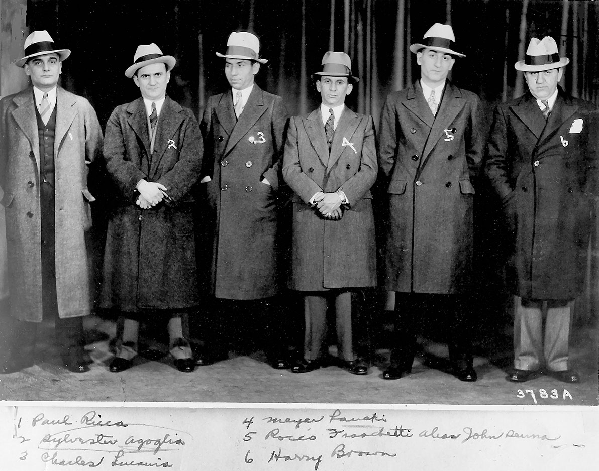 Men in a police lineup display their “mobster chic,” including Lucky Luciano (3) and Meyer Lansky (4). The John Binder Collection