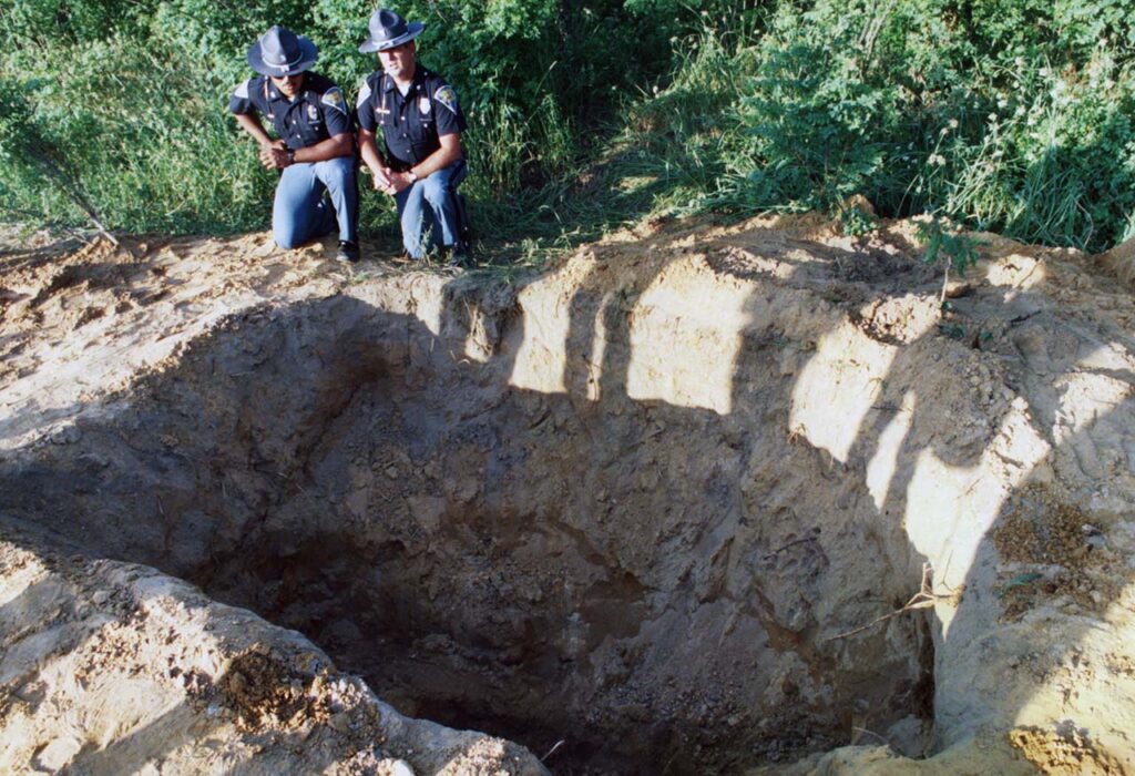 Caption: The bodies of Tony and Michael Spilotro were discovered on June 22, 1986, by farmer Michael Kinze Jr. in a five-foot-deep grave in a cornfield in rural Indiana. Associated Press