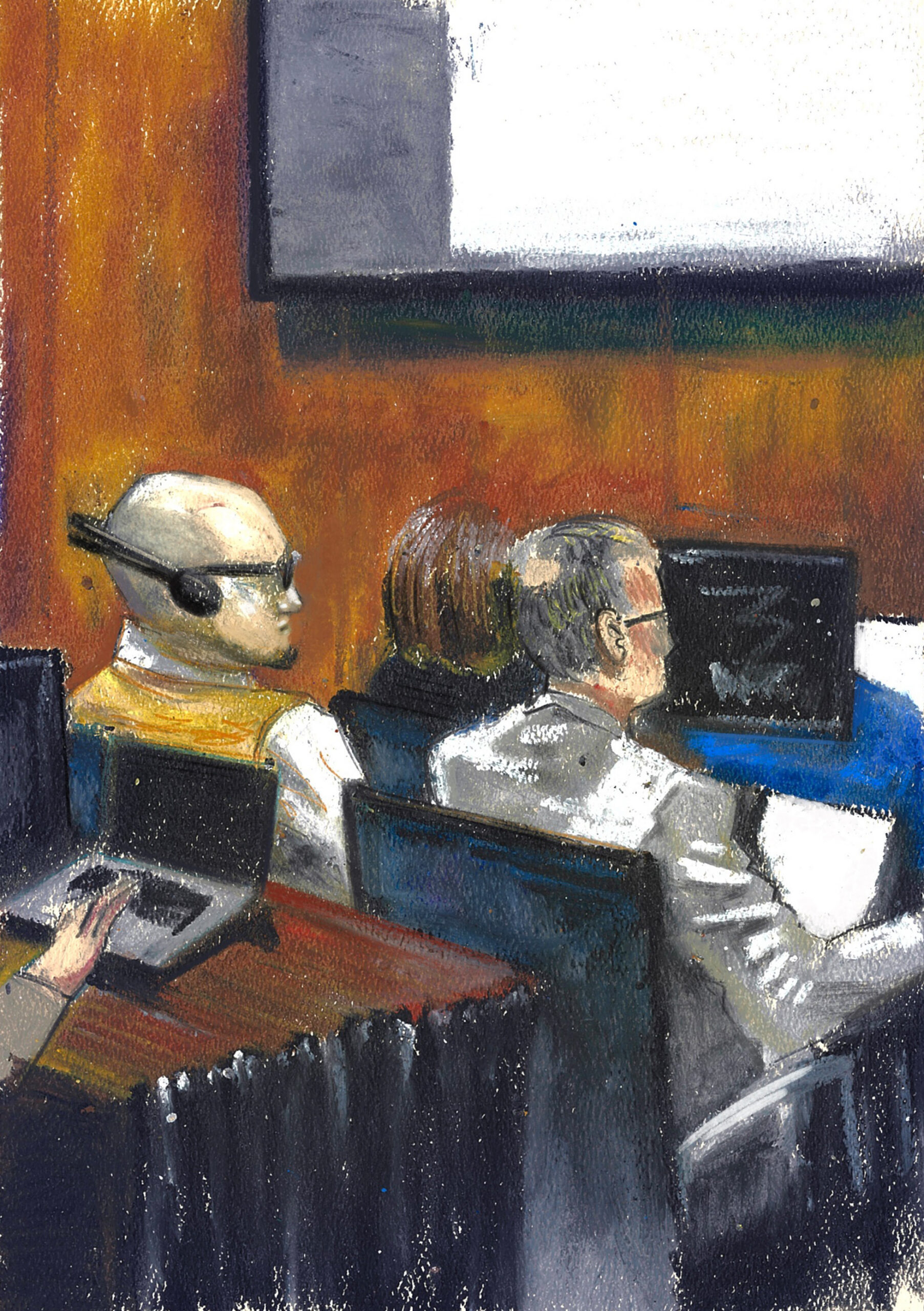 MS-13 member Jose Luis Reynaldo Reyes-Castillo, left, listens to an interpreter through headphones next to his attorney during his murder trial in Las Vegas. The Mob Museum Collection