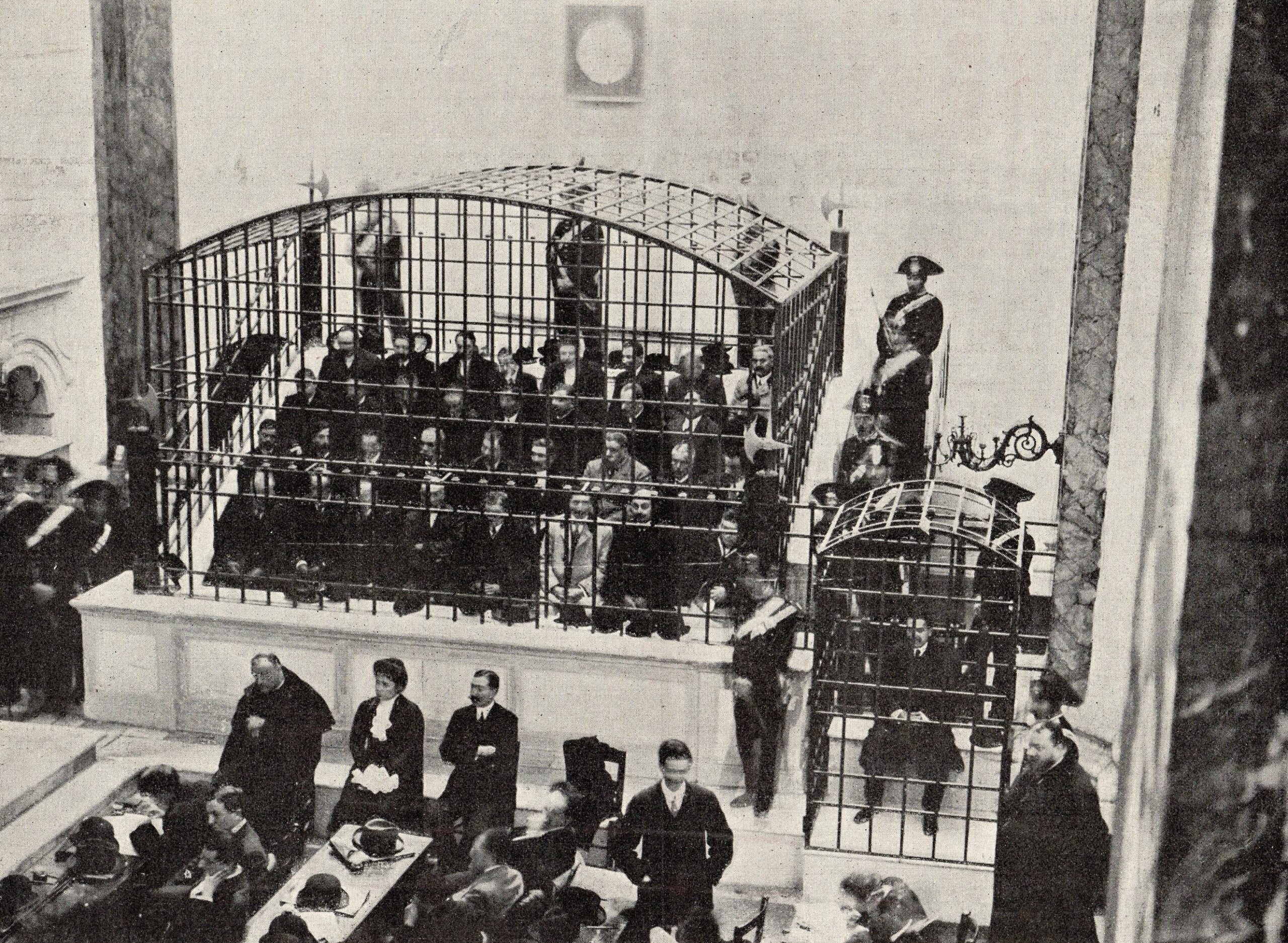 Iron cages separated accused Camorristi from the courtroom during the landmark Viterbo Trial in 1911. In the smaller enclosure sits alleged informer Gennaro Abbatemaggio, whose testimony shattered the traditional code of silence—even as later historians questioned portions of his account. Courtesy Cipollini Collection
