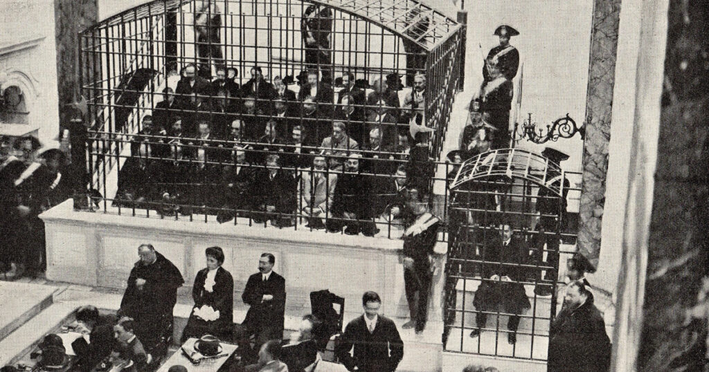 Iron cages separated accused Camorristi from the courtroom during the landmark Viterbo Trial in 1911. In the smaller enclosure sits alleged informer Gennaro Abbatemaggio, whose testimony shattered the traditional code of silence—even as later historians questioned portions of his account. Courtesy Cipollini Collection