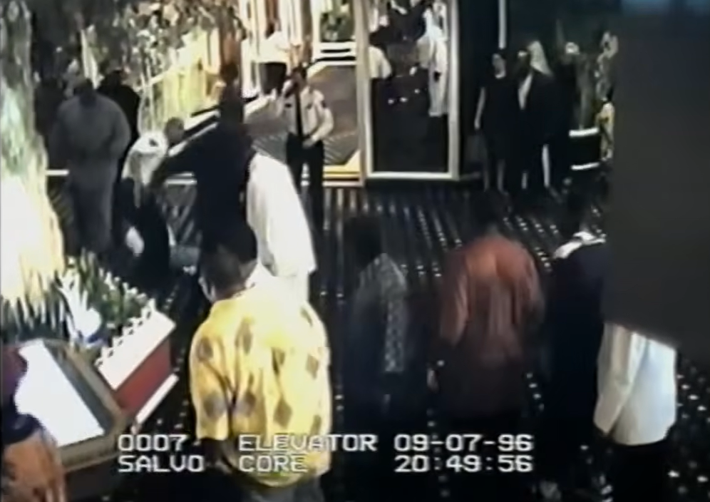 The surveillance footage inside the MGM Grand recorded the moment that Shakur and his entourage ambushed Orlando “Baby Lane” Anderson. In the upper left, Anderson can be seen lying on the ground while a security guard tries to prevent the men from kicking him. Clark County District Attorney’s Office