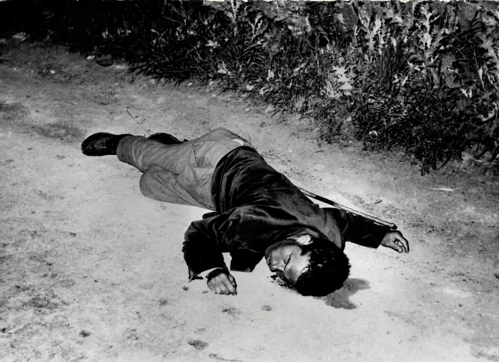 Photographed by Italy’s Farabola agency in the 1950s, this scene captures the grim aftermath of a Sicilian Mafia killing linked to rural cattle theft. The code of omertà ensured the perpetrators of such executions were rarely named. Courtesy Cipollini Collection